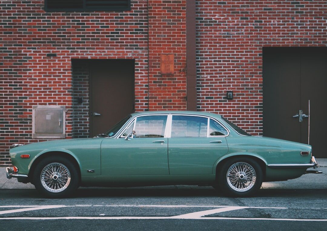 Bold 1970s sports coupe automobile parked in an urban setting