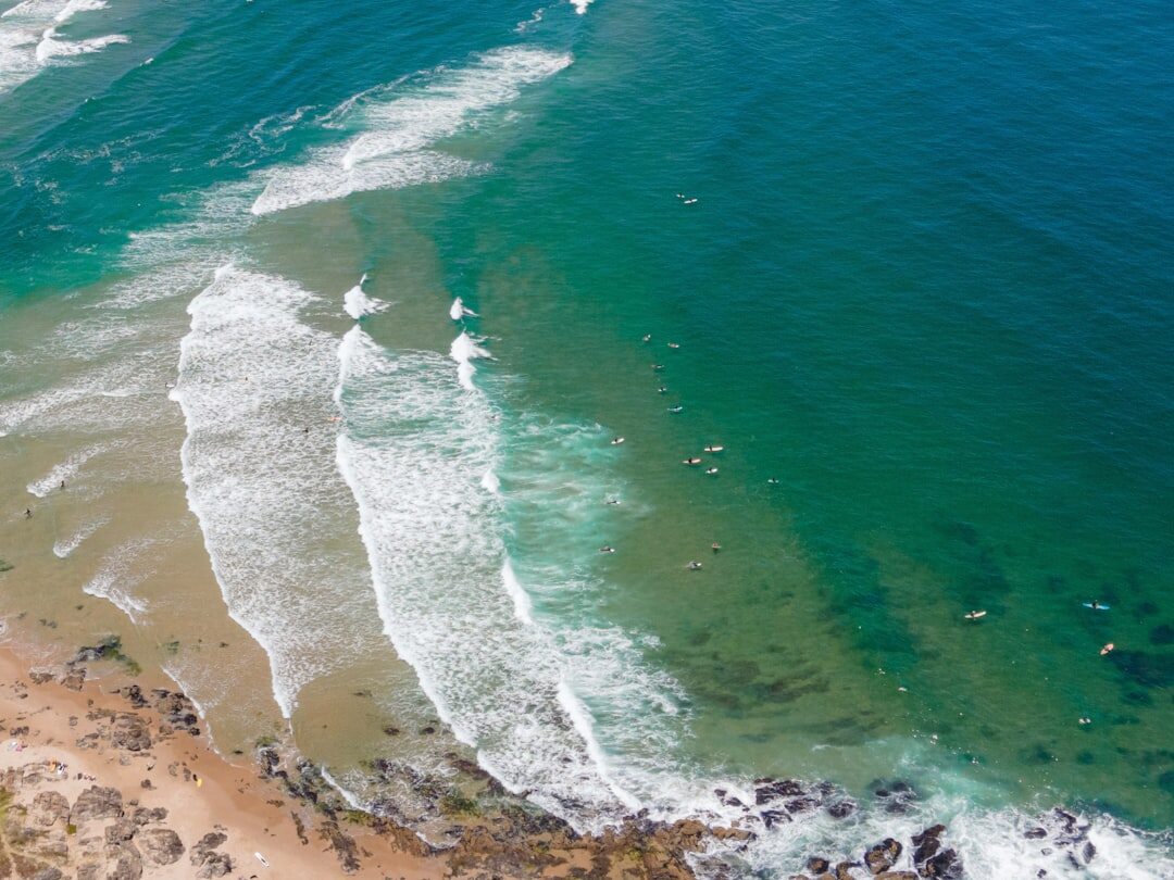 Aerial view of the wave-shaped Puente de la Barra bridge near Punta del Este