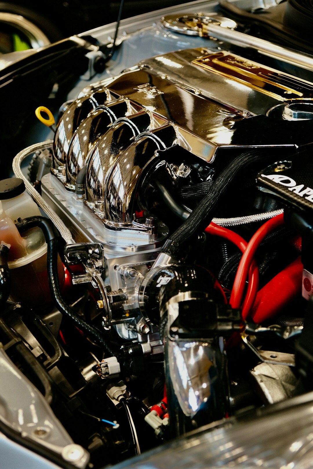 Close-up detail of a hypercar engine bay with intricate engineering