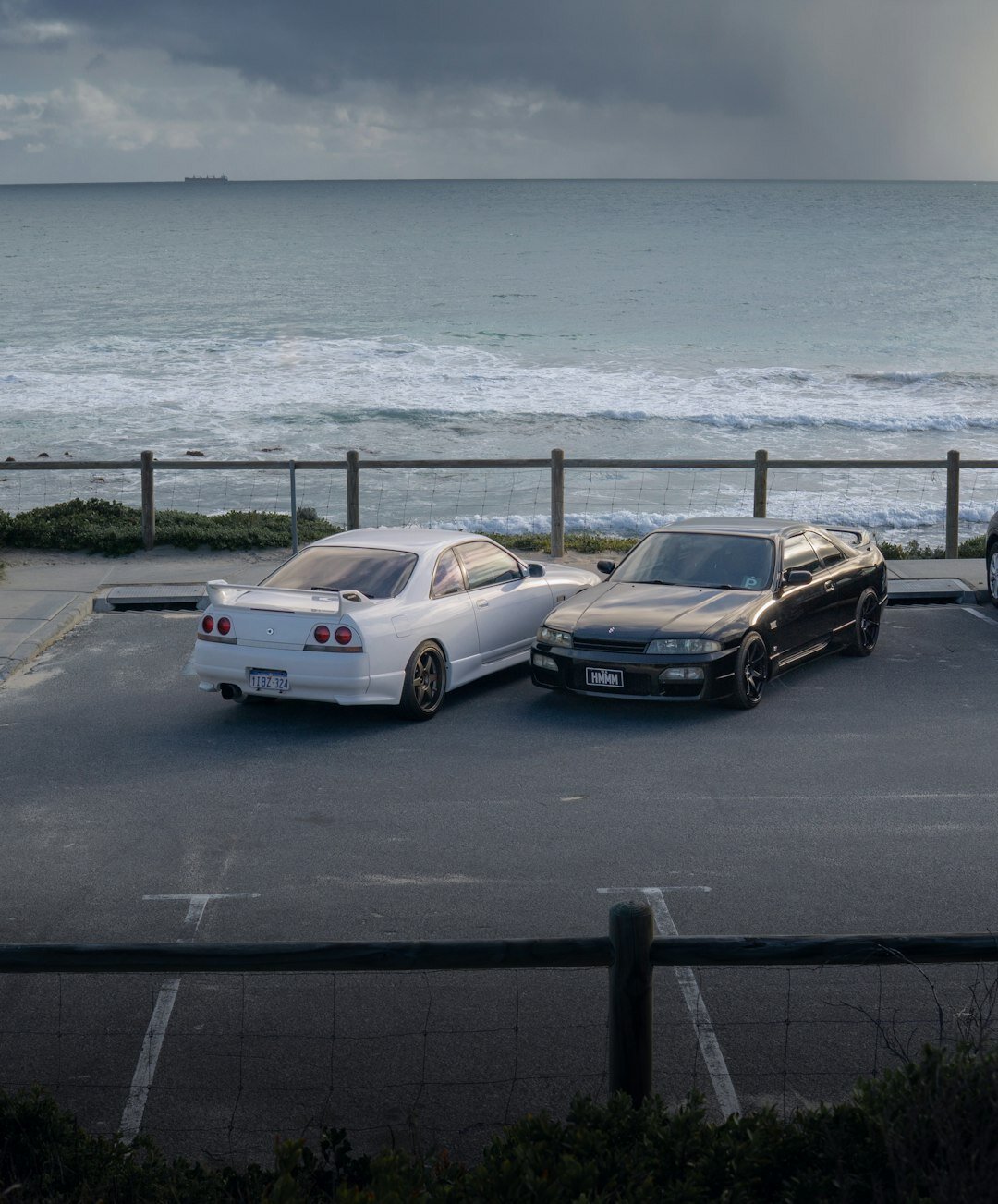 Vintage Ferrari parked on an empty Uruguayan coastal highway