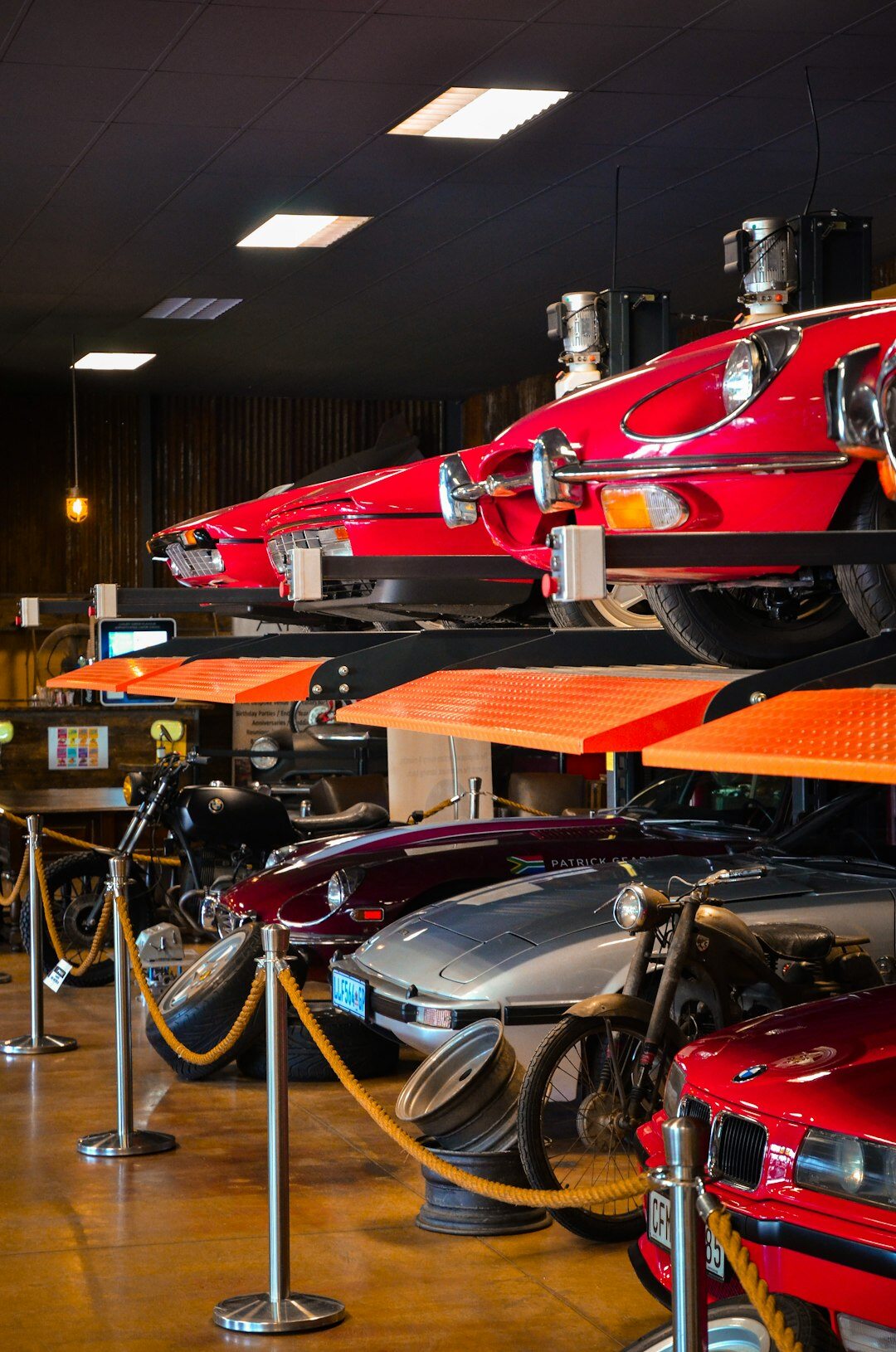 Interior of a classic automobile museum with vintage cars on display